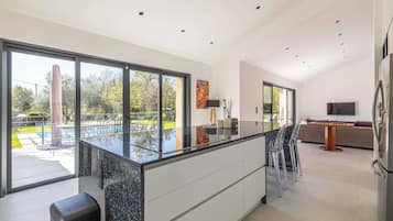 Villa | Private kitchen | Fridge, microwave, oven, stovetop
