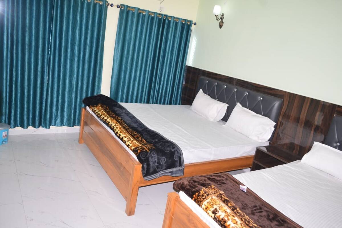 Deluxe Quadruple Room, City View