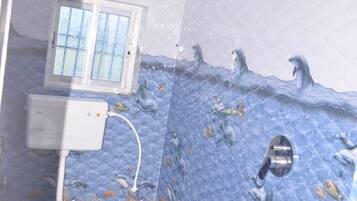 Shower, rainfall showerhead, towels, soap