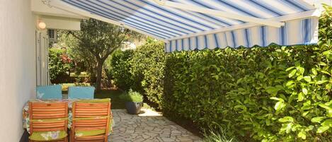 Apartment (One Bedroom Apartment with Terrace) | Living room | 32-inch flat-screen TV with cable channels