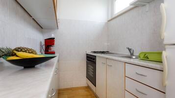 Apartment (One Bedroom Apartment with Balcony) | Private kitchen | Fridge