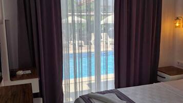 Classic Double Room, Balcony, Pool View | Blackout drapes, soundproofing, iron/ironing board, free WiFi