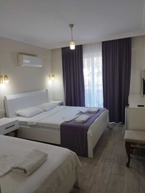 Classic Triple Room, Balcony, Garden View | Blackout curtains, soundproofing, iron/ironing board, free WiFi