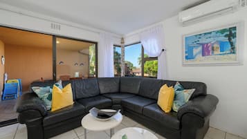 Standard Villa, Garden View | Living area | 40-inch flat-screen TV with satellite channels