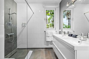 Hair dryer, towels, soap, shampoo
