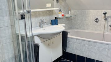 Shower, hair dryer, towels