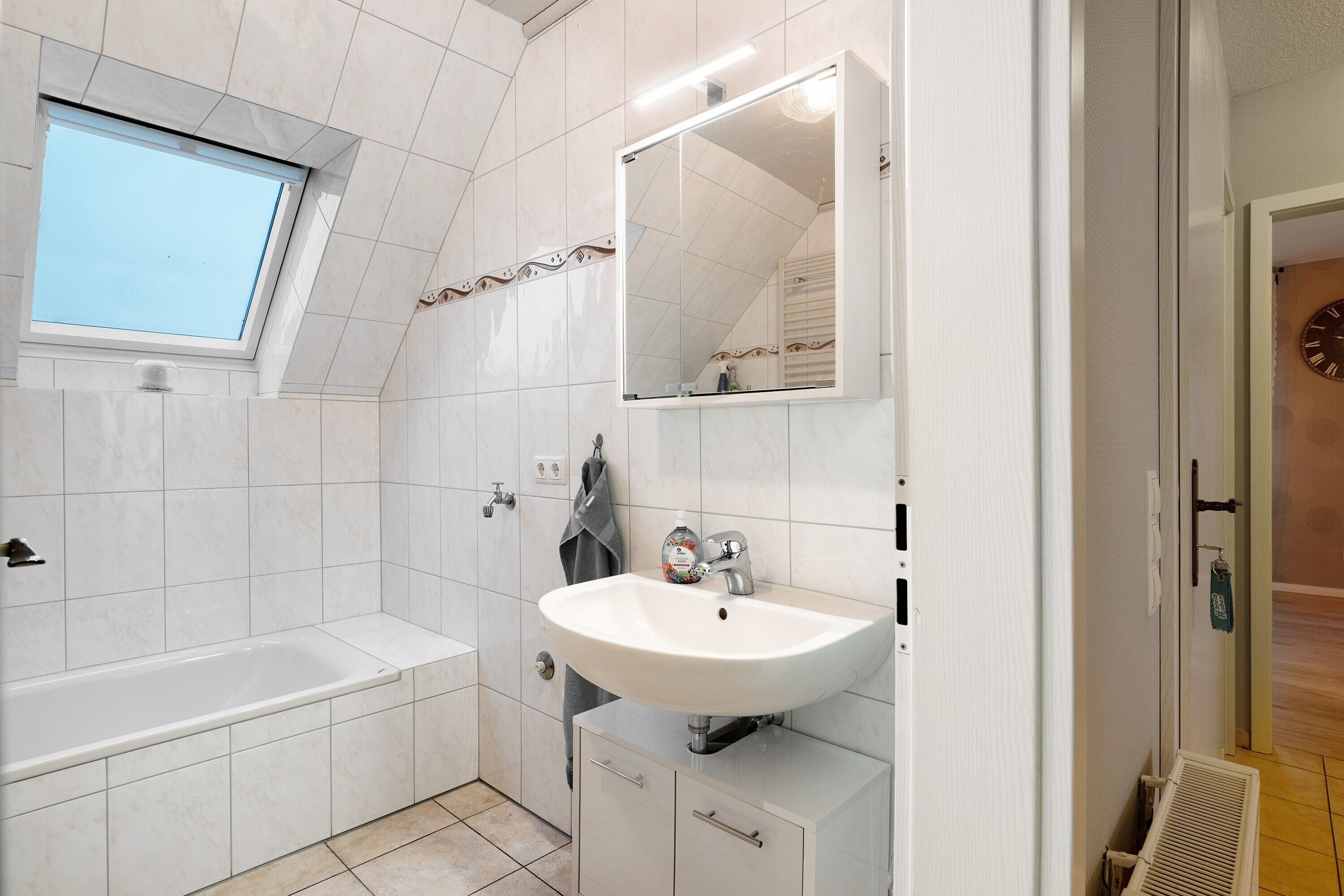 Een douche, handdoeken