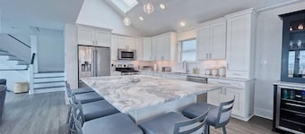 Immaculately Renovated Beachfront Townhome with Incredible Views!