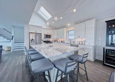 Immaculately Renovated Beachfront Townhome with Incredible Views!