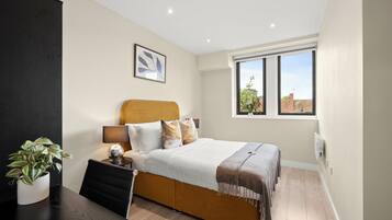 1 bedroom, desk, iron/ironing board, travel cot