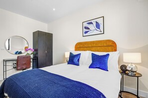 1 bedroom, desk, iron/ironing board, travel cot
