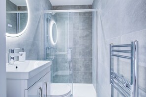 Hair dryer, towels, soap, shampoo
