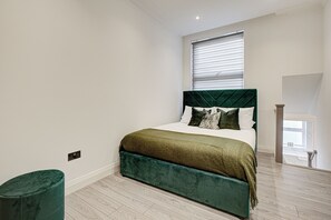 1 slaapkamer, een kluis op de kamer, een strijkplank/strijkijzer