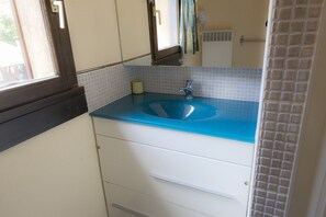 Regadera y secadora de cabello 