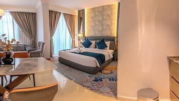 Junior Suite | In-room safe, desk, blackout drapes, iron/ironing board
