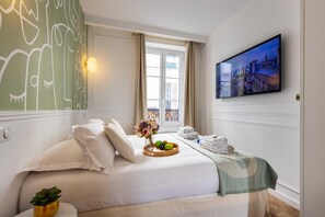 1 chambre, fer et planche à repasser, draps fournis