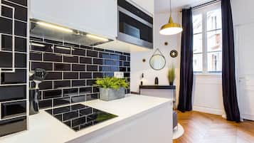 Apartamento | Cozinha privada | Cooktop