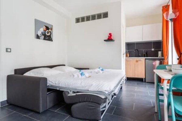 Apartemen | 1 kamar tidur, setrika/meja setrika, dan seprai linen