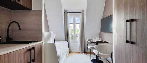 1 bedroom, laptop workspace, iron/ironing board, bed sheets