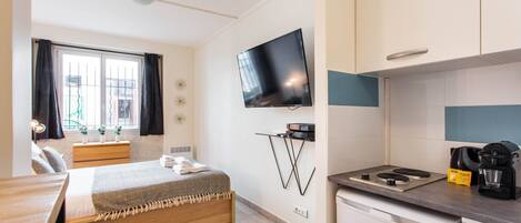 1 bedroom, laptop workspace, iron/ironing board, bed sheets