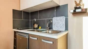 Apartemen | Dapur pribadi | Lemari es, microwave, kompor, dan mesin pencuci piring