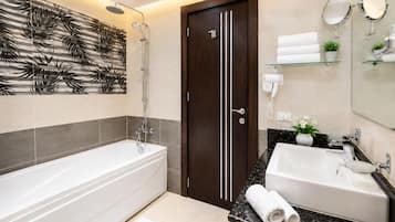 Superior Room | Bathroom | Shower, hair dryer, towels, soap