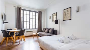 Departamento | 1 habitación, tabla de planchar con plancha y ropa de cama