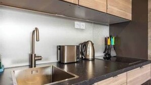 Apartment | Private kitchen - Intimate Studio - 2P - Passy (Paris)