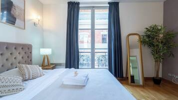 1 bedroom, laptop workspace, iron/ironing board, bed sheets