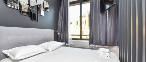 1 bedroom, laptop workspace, iron/ironing board