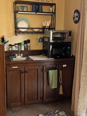 Fridge, microwave, coffee/tea maker, toaster