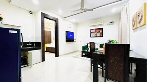 1BHK with Balcony | Living area | TV
