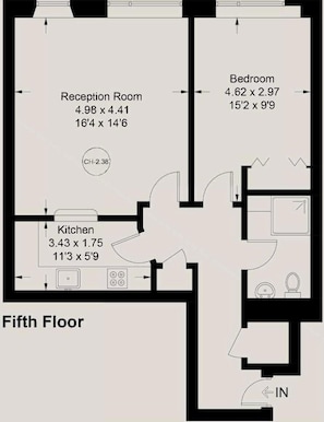 A floor plan of a hotel room on the fifth floor, including a reception room, bedroom, and kitchen area.