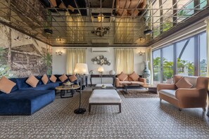Traditional Villa, Private Pool | Living area | 43-inch LED TV with cable channels - Echor Reis Magos Villa Goa (Verem)