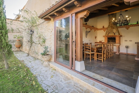 Outdoor dining. Country House 'La Anunciada' with Lake View and Private Garden