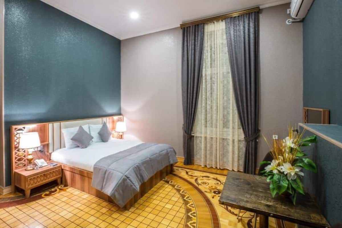 Deluxe Double Room, City View | 1 bedroom, desk, soundproofing, free WiFi