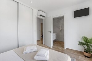 2 quartos, ferros/tábuas de passar roupa, Wi-Fi de cortesia