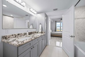Shower, hair dryer, towels, shampoo