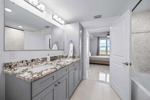 Shower, hair dryer, towels, shampoo