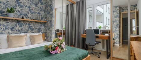 2 bedrooms, blackout curtains, iron/ironing board, cots/infant beds