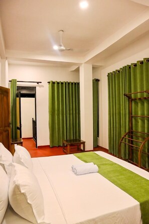 Family Quadruple Room, Patio | Desk, laptop workspace, iron/ironing board, free WiFi