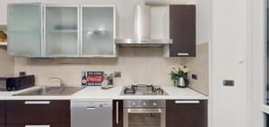 Fridge, oven, coffee/tea maker, toaster