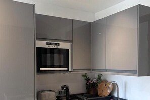 Fridge, microwave, electric kettle, toaster