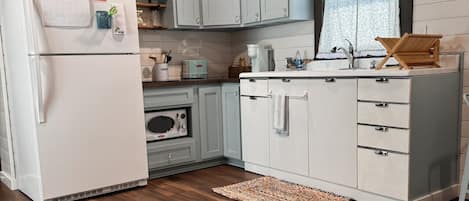 Fridge, microwave, stovetop, coffee/tea maker