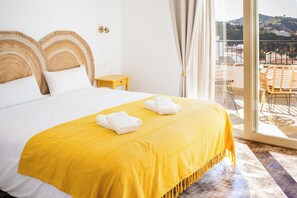 Deluxe Suite, Multiple Beds, Private Bathroom, Sea View | Down duvets, memory-foam beds, blackout curtains, soundproofing
