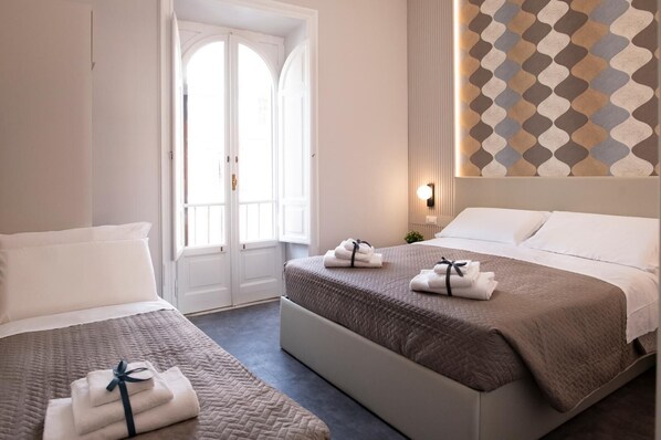 Economy kamer | Een minibar, een bureau, gratis wifi, beddengoed