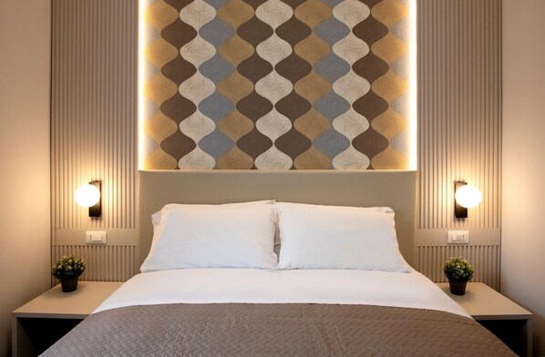 Economy kamer | Een minibar, een bureau, gratis wifi, beddengoed