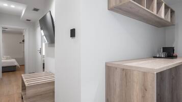 Duplex Suite with private courtyard | Living area | Flat-screen TV