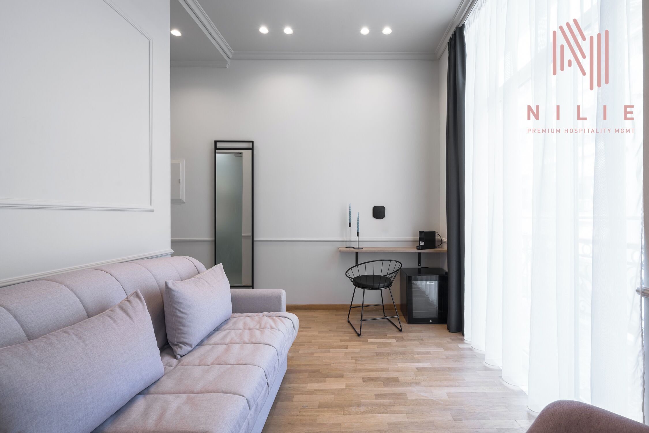 Deluxe Suite, Balcony | Living area