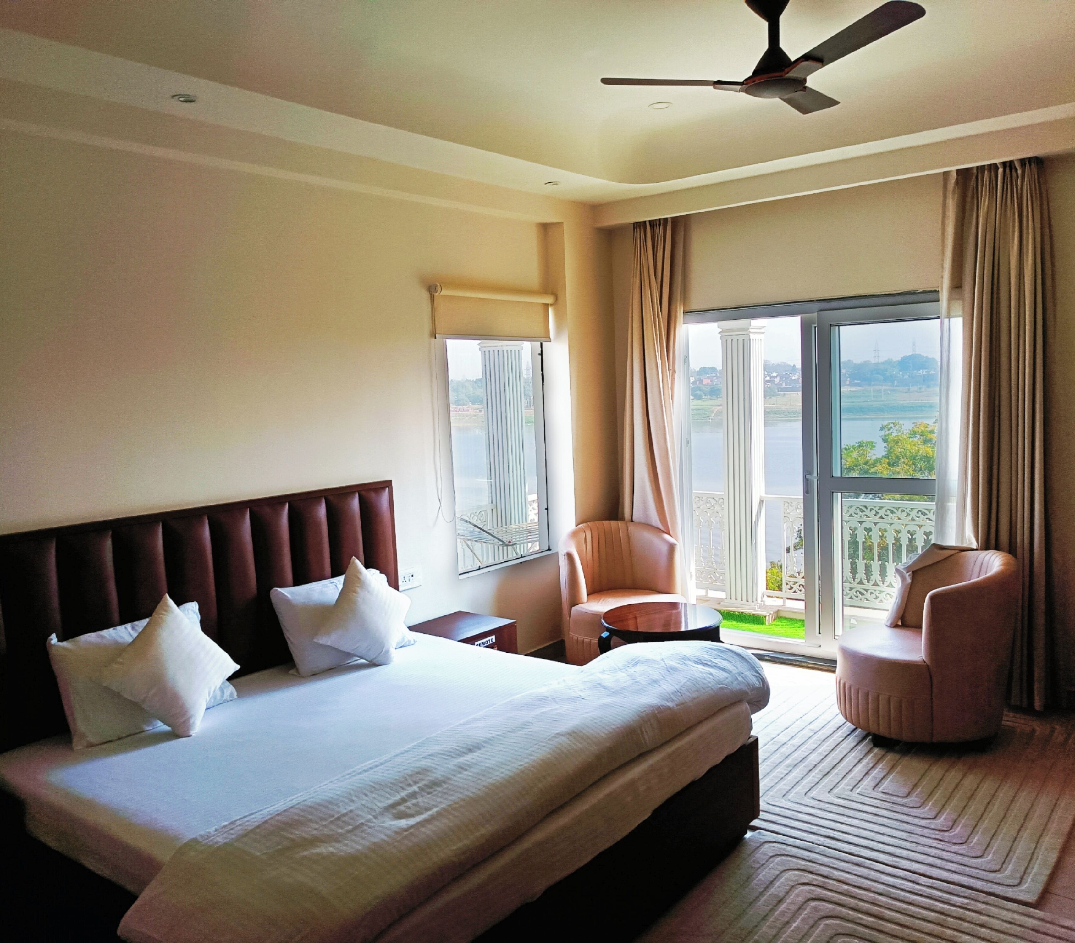 Luxury Double Room, 1 King Bed, Balcony, River View | In-room safe, desk, laptop workspace, blackout drapes